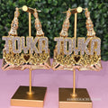 TOYKA NAMEPLATE EARRINGS